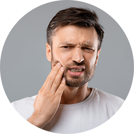 Man with tooth pain before seeing an emergency dentist in Baltimore