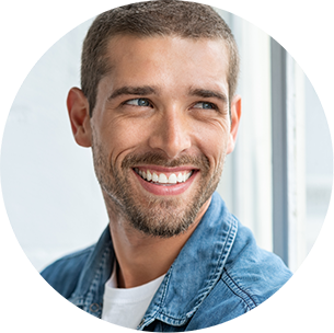 Smiling man in a denim jacket