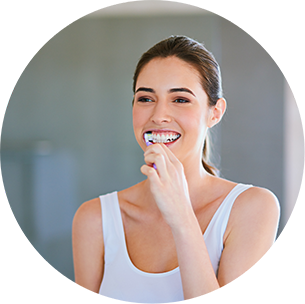 Woman brushing her teeth